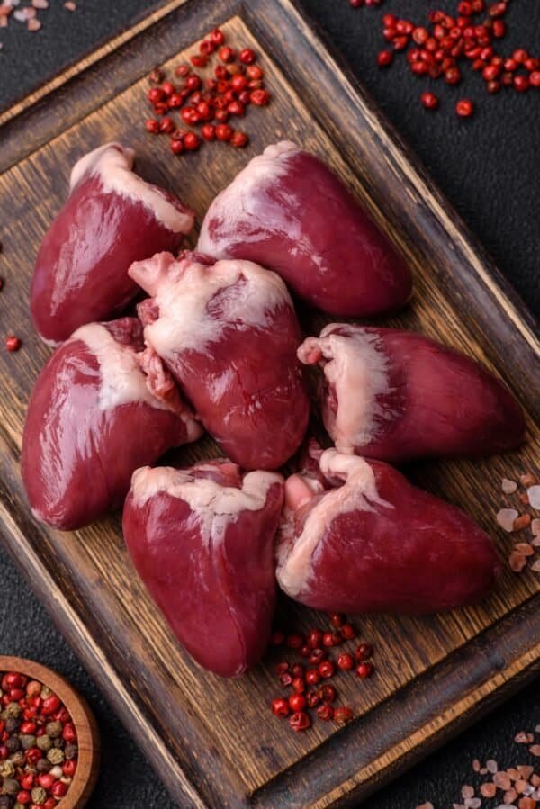Raw turkey or chicken hearts with salt and spices